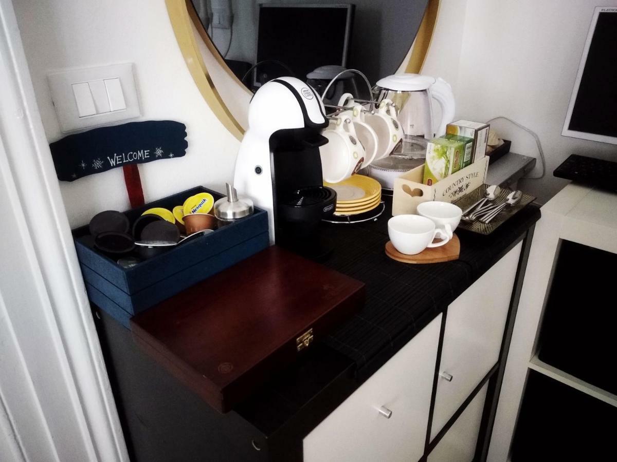 Suite Il Letto Sotto Il Tetto Catania Bagian luar foto